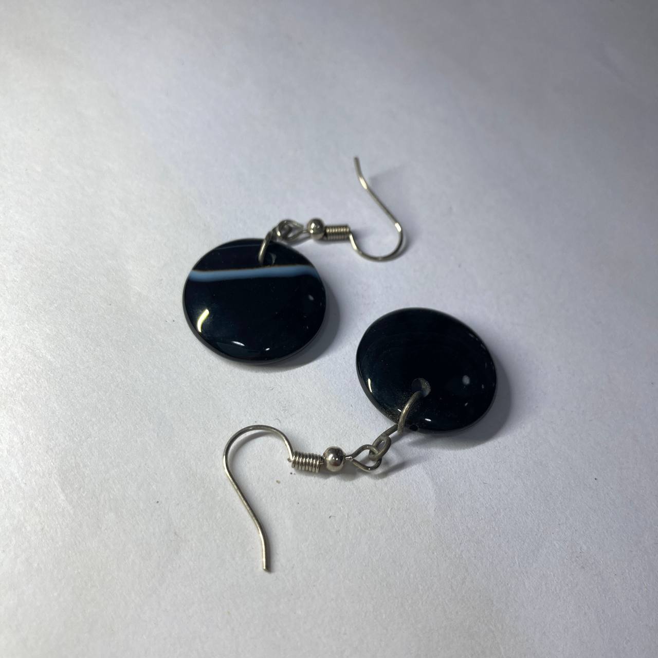 Soleimani Agate and steel earrings on a white background